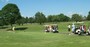 Women teeing off Hole #7 in the B & C Horserace